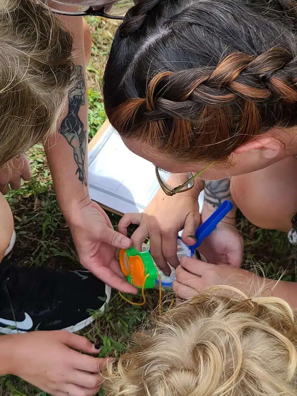 Children doing a hands-on nature activity
